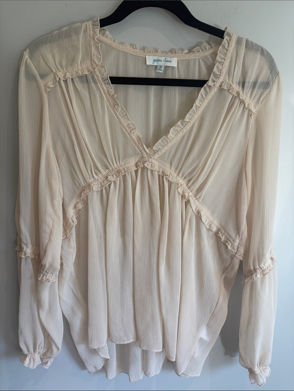 Grace & Lace Sheer Ruffled V-Neck Blouse in Cream